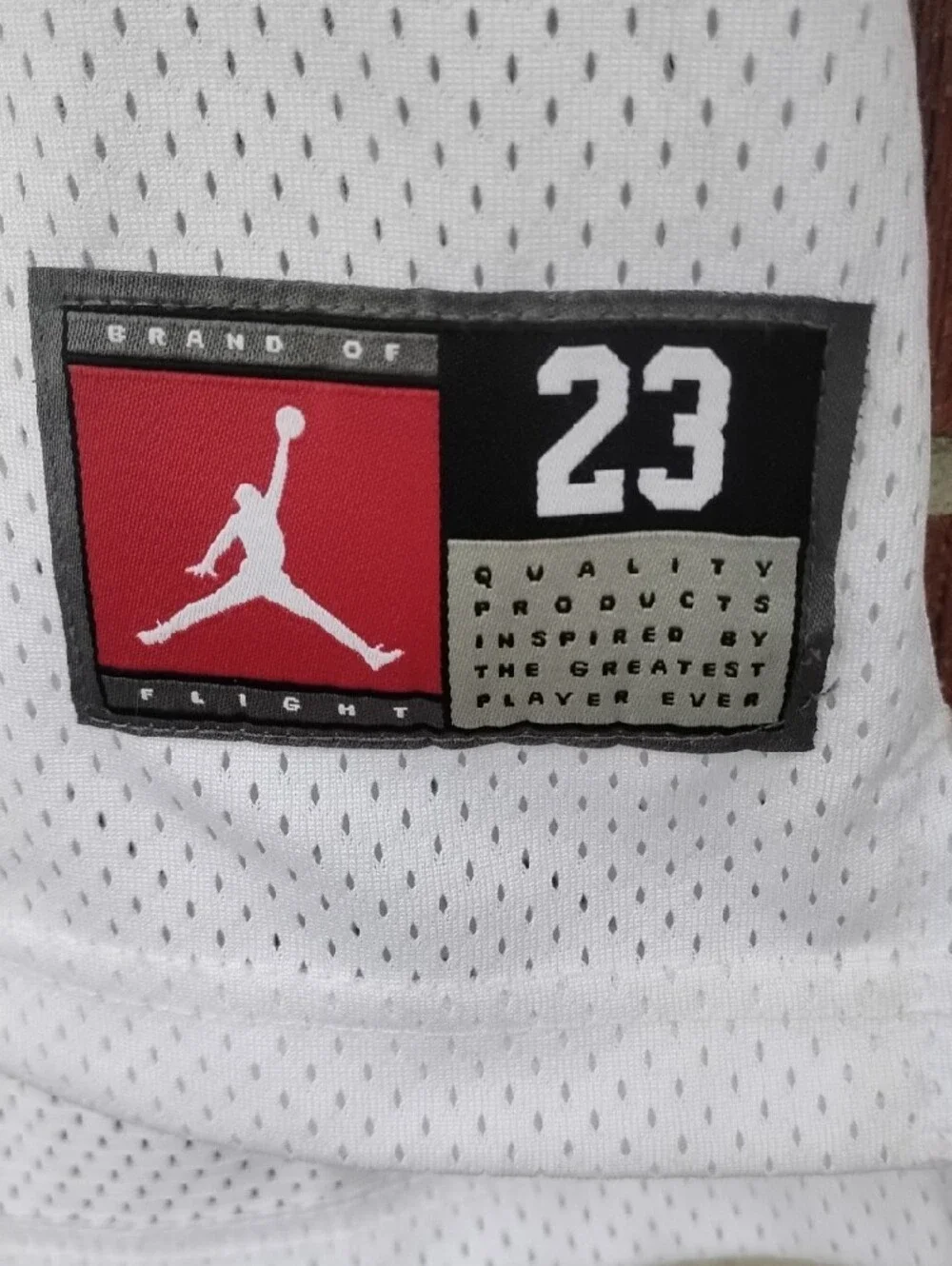 Jordan White Mesh Basketball Jersey with Red Accents
